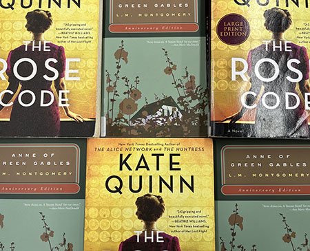 Several book club titles arranged in a grid pattern